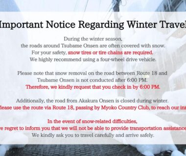 Printed notice detailing winter road closures and travel safety information for Myoko Tsubame onsen Iwatoya in Niigata
