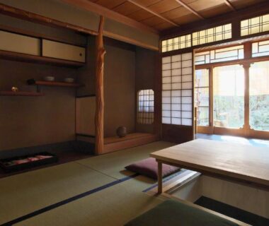 Tatami room with low table, shoji screens and garden view at NAGOMI Kyoto Okazaki, Kyoto Kansai
