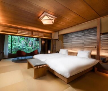 Tatami room with twin beds, wooden ceiling, shoji screens and garden view at Nanzenji sando KIKUSUI Kyoto