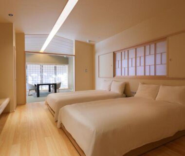 Twin beds with shoji screens and wooden flooring at Nara Kasugaokuyama Tsukihitei, Nara, Kansai, Japan