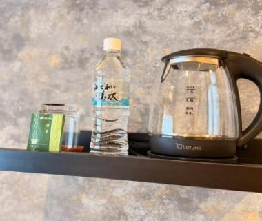 Electric kettle, bottled water and tea packets on shelf at Nara Ryokan room, Nara Kansai Japan
