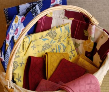 Basket of folded yukata and sashes on tatami at Nasu Hoshi no Akari, Tochigi