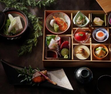 Lacquer multi-compartment box with assorted small dishes, soup bowl and garnished plate at Nasu-Onsen Shinshun no Kago Hewitt Resort, Tochigi
