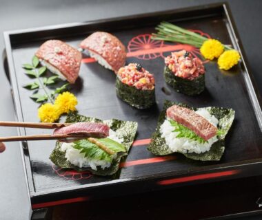 Assorted sushi on lacquer tray with chopsticks at Nazuna Kyoto Tsubaki St, Kyoto