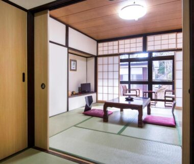 Tatami room with low table and shoji screens at Nikko Tokanso, Tochigi, Kanto, Japan