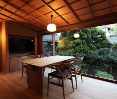 Wooden interior dining area with garden view at Nishimuraya Honkan in Hyōgo, Kansai