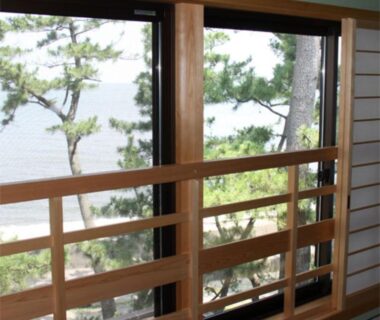 Shoji-framed pine and sea view from tatami room at Nisshokan in Mie, Kansai, Japan