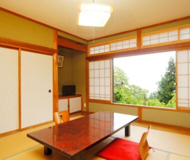 Tatami room with low table, zaisu chairs and shoji screens at Nobori, Tokyo, Kantō, Japan