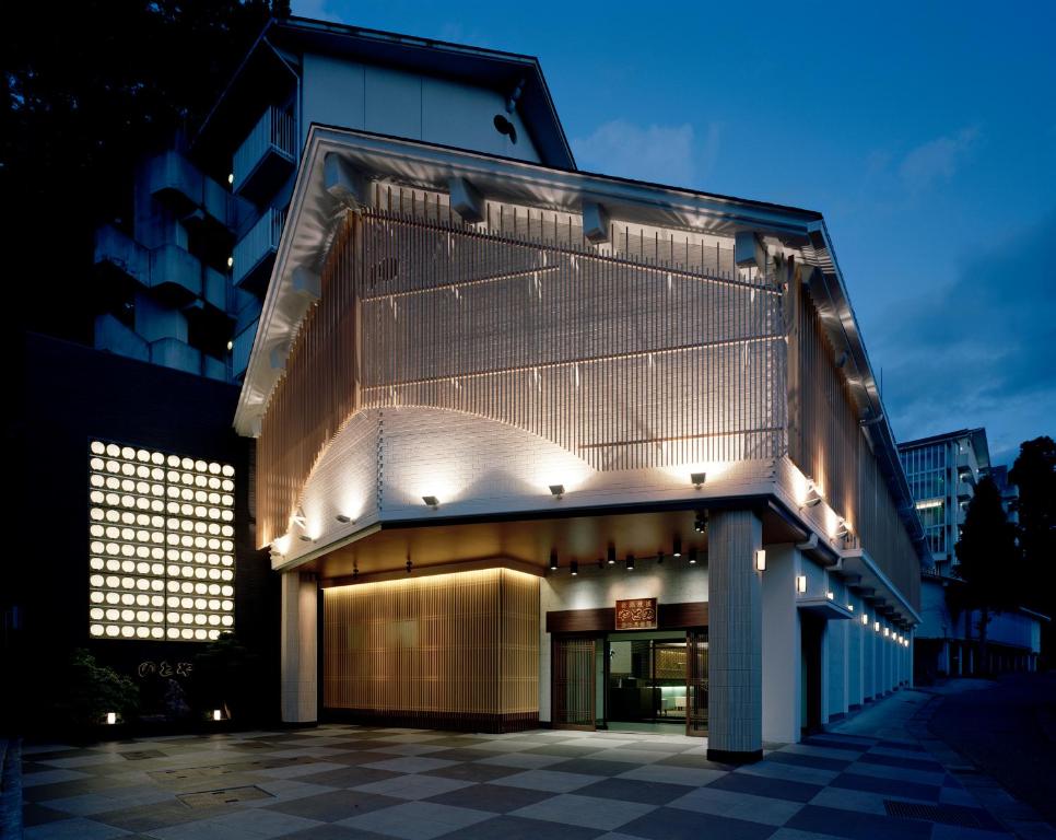 Dusk ryokan exterior Notoya Ishikawa Japan Illuminated Notoya entrance and facade at dusk in Ishikawa, Japan