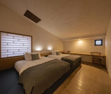 Twin beds and shoji screen in OTARU RETREAT room, Hokkaidō