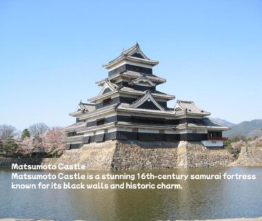 Matsumoto Castle with moat and reflection, near Oiwakeya Ryokan in Nagano