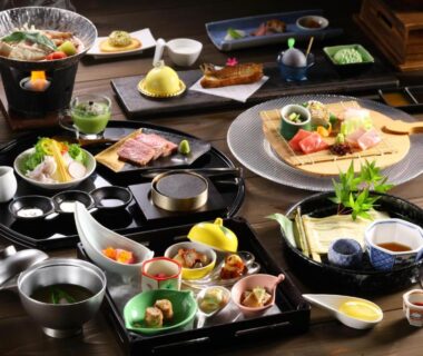 Assorted Japanese small dishes on lacquer trays, Oku Yugawara SANSUIROU, Kanagawa, Japan