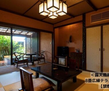 Traditional tatami room with low table, shoji screens and garden terrace at Omoideno Jinde, Shizuoka