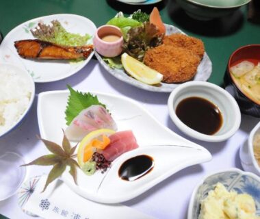 Assorted ryokan dinner with sashimi, rice, miso soup and fried dish at Onsen Urashima Hiroshima