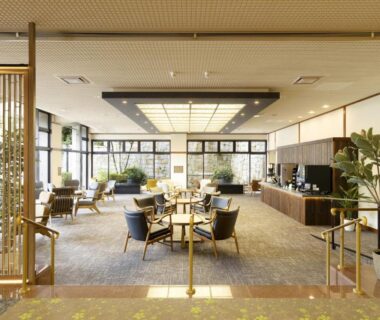 Spacious lounge with armchairs, tables and large windows in Ooedo Onsen Monogatari Premium Gero Honkan, Gifu