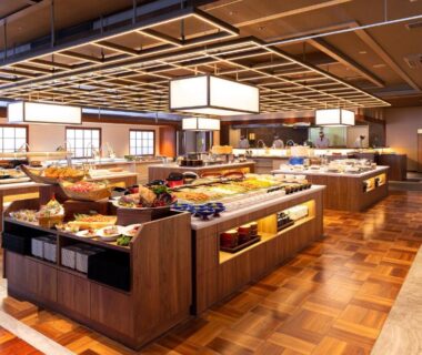 Spacious wooden buffet dining area at Ooedo Onsen Monogatari Premium Ito Hotel New Okabe in Shizuoka