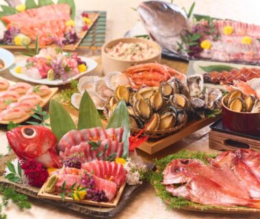 Assorted sashimi, shellfish and whole fish platters at Ooedo Onsen Monogatari Premium Ito Hotel New Okabe, Shizuoka