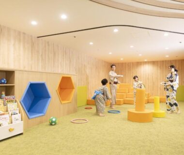 Children playing in bright playroom at Ooedo Onsen Monogatari Kaga Maruya, Ishikawa