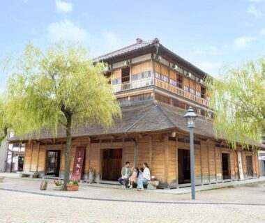 Traditional wooden ryokan entrance at Ooedo Onsen Monogatari Yamashiro Saichoraku in Ishikawa