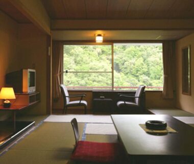 Tatami room with low table and window seating at Ookawaso in Fukushima, Tōhoku, Japan