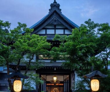 Lanterns and traditional gabled entrance of Osawayama Onsen Osawakan in Niigata