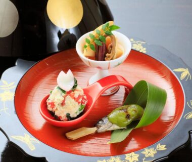 Assorted small appetizers on red lacquer tray at Otogitei Kofu, Chūbu Nagano