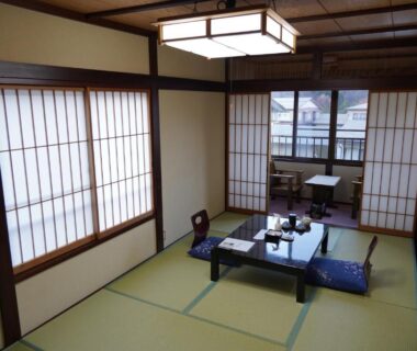Traditional tatami room with low table and shoji screens at Oyado Eitaro, Gifu, Chubu, Japan