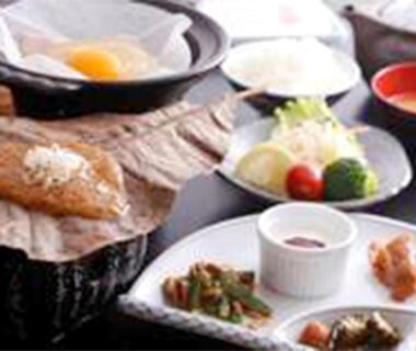 Traditional Japanese meal set with grilled fish, side dishes and soup at Oyado Hachibei, Gifu Chūbu