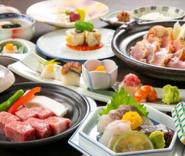 Assorted Japanese dishes with sashimi and grilled beef at Oyado Ichizen in Ōita, Kyūshū