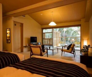 Room with twin beds, tatami seating and garden view at Oyado The Earth in Mie