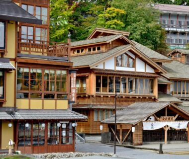 Cluster of traditional wooden ryokan buildings at Oyado Yukizumi in Gunma town
