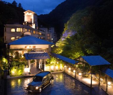Night lit entrance and driveway with parked car at Hanare Matsushimakaku in Fukushima, Tōhoku