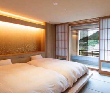 Low platform twin beds on tatami with shoji doors and balcony, Rangetsu Kyoto