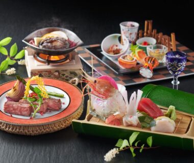 Assorted dishes with sashimi, grilled meat, and tabletop pot at Rantei in Miyagi, Tōhoku