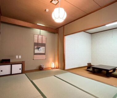Tatami room with low table, tokonoma and shoji screens, Renovated room Japanese inn Matsumoto Iwate
