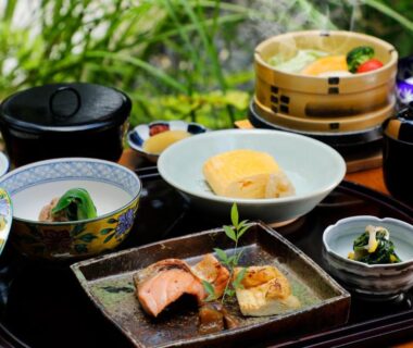 Assorted Japanese breakfast dishes on lacquer tray at Ryokan Asukasou near Nara Park