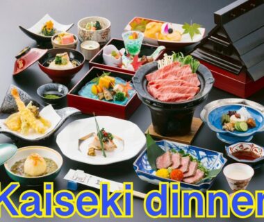 Assorted kaiseki dishes on lacquered table at Ryokan Asunaro in Gifu