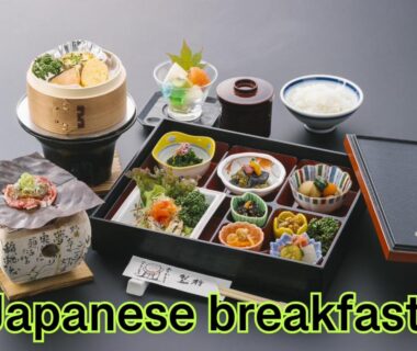 Assorted traditional breakfast set on lacquer tray with rice, steamed dish, small side bowls and chopsticks at Ryokan Asunaro, Gifu