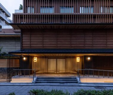 Lantern lit wooden entrance of Ryokan Ginkaku Kyoto in Kyoto, Kansai, Japan
