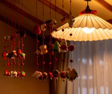 Fabric hanging ornaments and paper umbrella lamp in Ryokan Gizan interior, Gifu, Chūbu