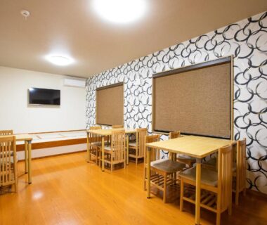 Wooden dining tables and chairs at Ryokan Hitaya, Ōita, Kyūshū, Japan
