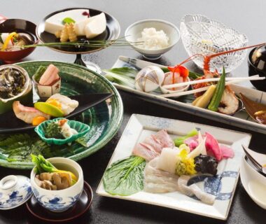 Assorted Japanese dishes with sashimi and side dishes at Ryokan KANADE in Kyoto, Kansai