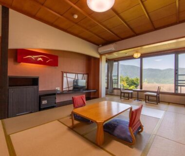 Traditional tatami room with low table and shoji at Ryokan Kiritani Hakoneso in Kanagawa
