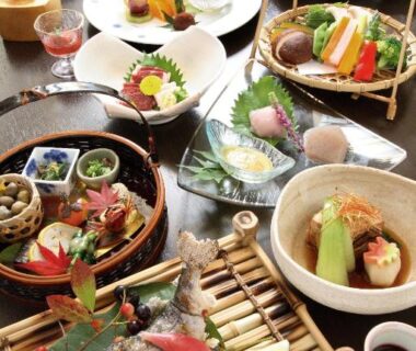 Traditional multi-course spread with grilled fish and sashimi at Ryokan Kono-Yu in Kumamoto, Kyūshū