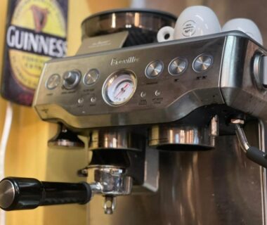 Stainless steel espresso machine with portafilter and pressure gauge at Ryokan La Luna Shizuoka