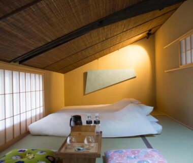 Tatami room with futon bedding, shoji screens and low tea tray, Ryokan Mugen (Adult Only), Kyoto