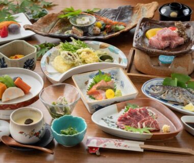 Assorted traditional Japanese multi-course dishes with sashimi, tempura and grilled items at Ryokan Nanjoen, Kumamoto Kyūshū