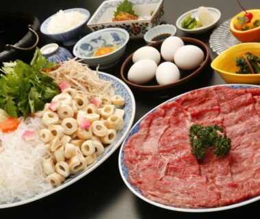 Thinly sliced beef, vegetables and eggs served for hot pot at Ryokan Sanoya in Kyoto
