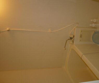 Small modular bath with handheld shower, Ryokan Shimizu bathroom in Kyoto