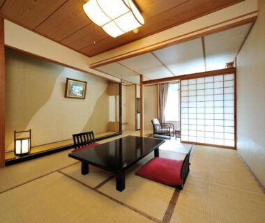 Traditional tatami room with low table and shoji screens at Ryokan Tanigawa in Gunma, Kantō, Japan